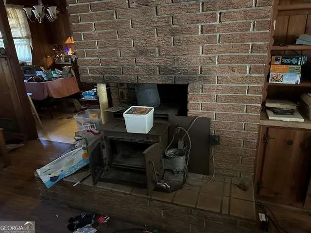 a bedroom with a bed and a flat tv screen