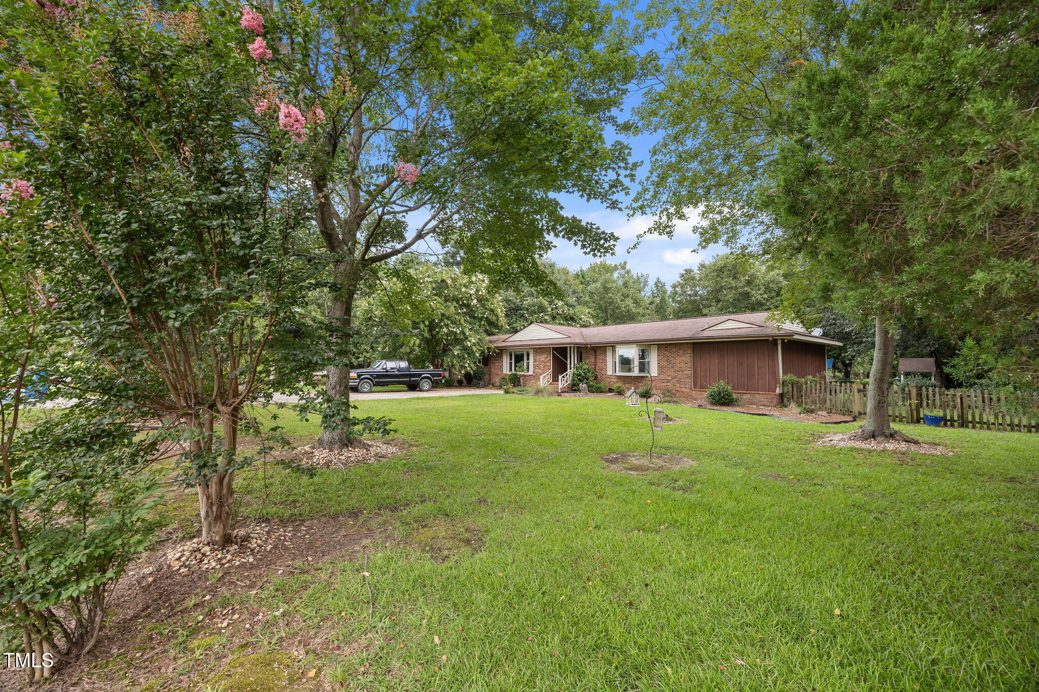 1413 Bud Hawkins Road Dunn, NC 28334 - Photo 1 of 51 A wonderful home with over 2.5 acres. Side Entry Garage. 2 Separate concrete driveways.