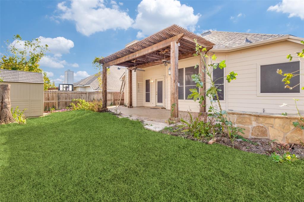 4921 Tulip Lane Fort Worth, TX 76137 - Photo 12 of 12 a front view of a house with garden