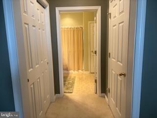 700 Cattail Cove, Unit 207 Cambridge, MD 21613 - Photo 19 of 29 a view of a bathroom from a hallway