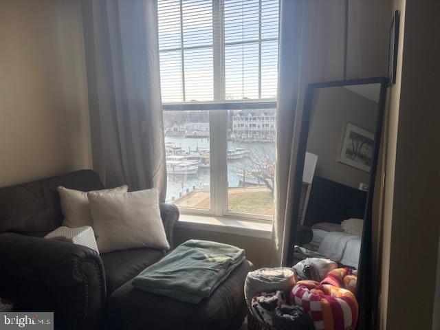 700 Cattail Cove, Unit 207 Cambridge, MD 21613 - Photo 21 of 29 a bedroom with a bed and a window
