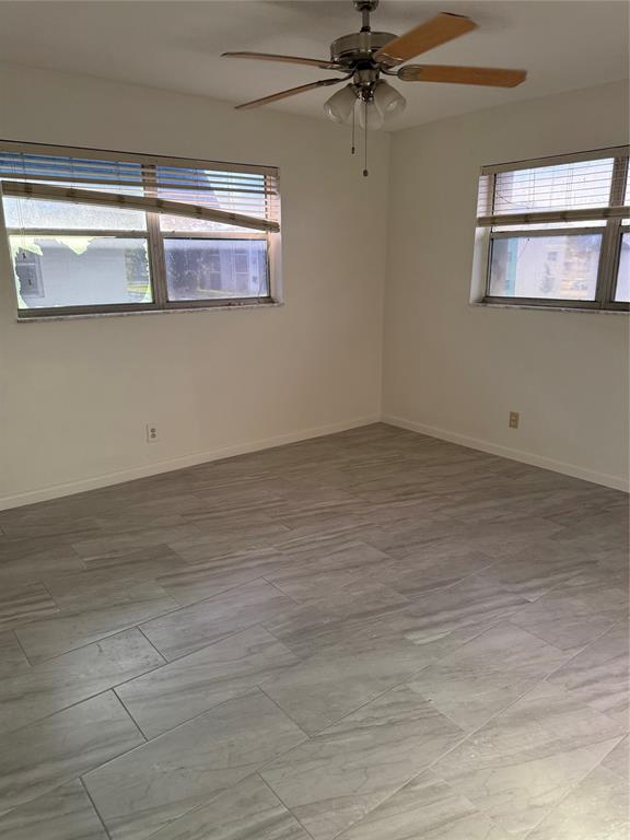 7901 North Colony Circle, Unit 201 Fort Lauderdale, FL 33321 - Photo 8 of 9 a view of an empty room with a window