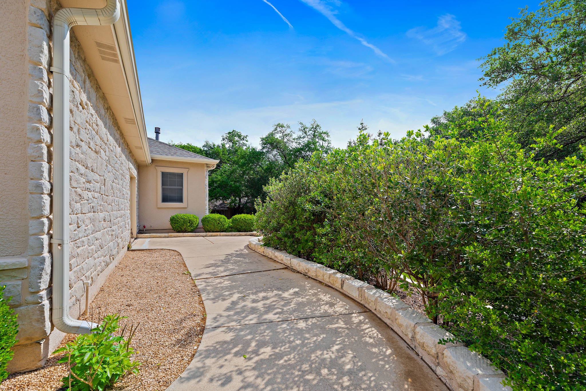 106 Wild Turkey Lane Georgetown, TX 78633 - Photo 3 of 39 a view of a pathway with a house
