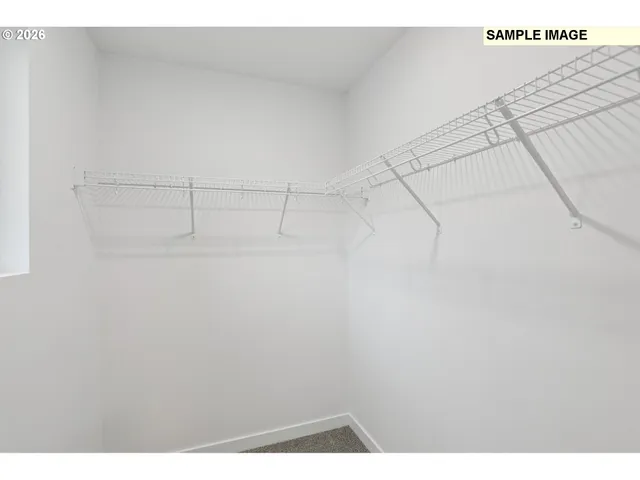 a view of a room with an empty space