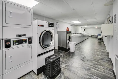 a hallway with cabinets