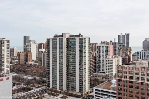 a view of city with tall buildings