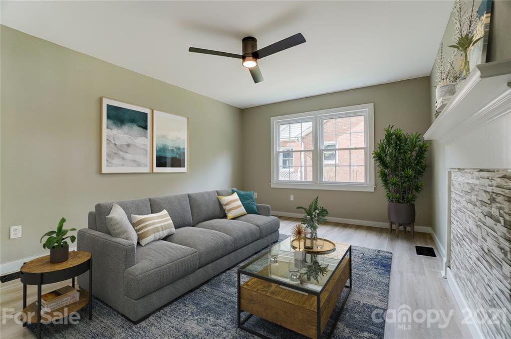 2305 Remount Road Charlotte, NC 28208 - Photo 11 of 31 a living room with furniture and a window