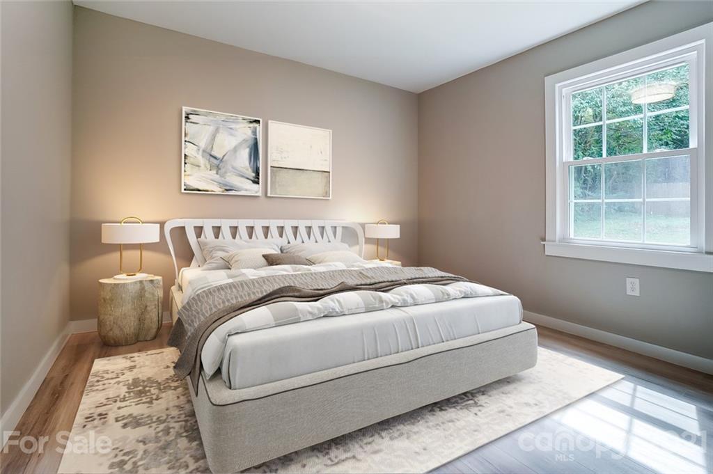 2305 Remount Road Charlotte, NC 28208 - Photo 12 of 31 a bedroom with a bed and a window