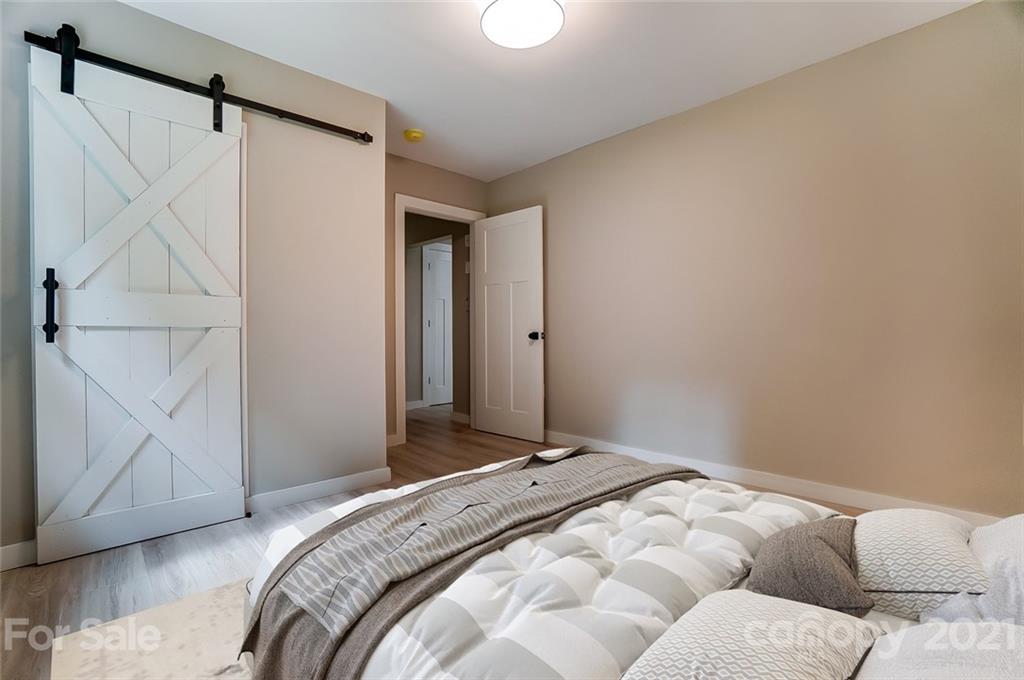 2305 Remount Road Charlotte, NC 28208 - Photo 14 of 31 a bedroom with a bed and a window