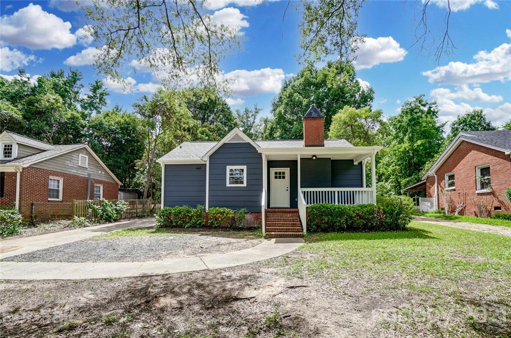 2305 Remount Road Charlotte, NC 28208 - Photo 26 of 31 a front view of a house with garden