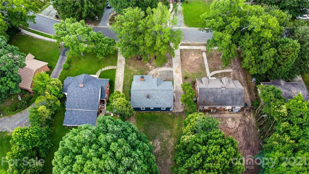 2305 Remount Road Charlotte, NC 28208 - Photo 8 of 31 an aerial view of a house with a yard and large tree