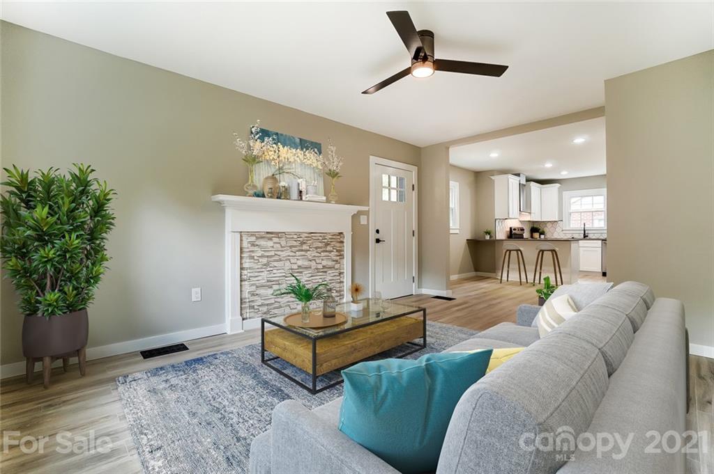 2305 Remount Road Charlotte, NC 28208 - Photo 9 of 31 a living room with furniture and a potted plant
