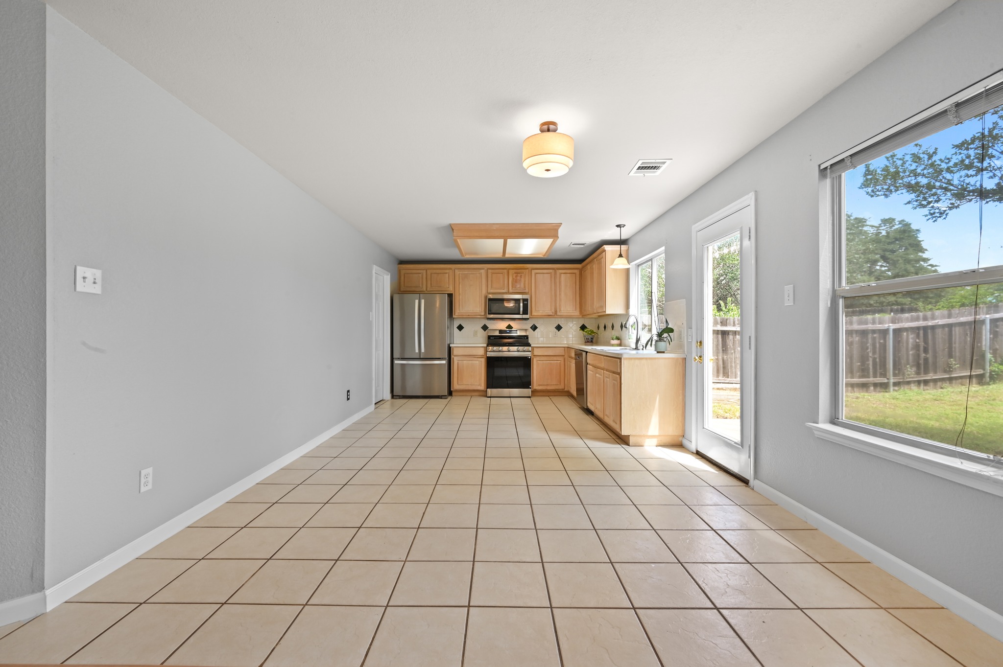 2700 Cradlerock Terrace Austin, TX 78748 - Photo 13 of 29 a view of kitchen view with wooden floor