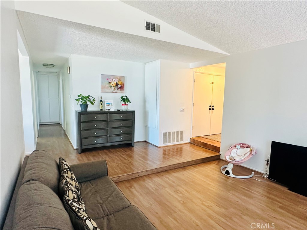 2111 Whitestone Drive Riverside, CA 92506 - Photo 14 of 29 a living room with furniture and a wooden floor