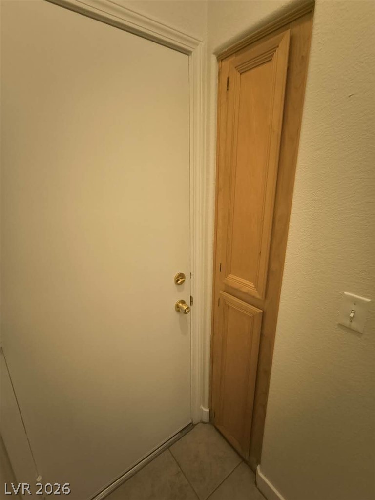 9725 Pima Point Avenue Las Vegas, NV 89147 - Photo 21 of 35 Clean lines define this versatile entryway with ample storage.