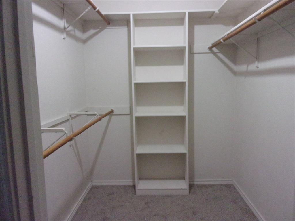 1511 Spanish Oak Drive Granbury, TX 76048 - Photo 12 of 16 a view of an empty walk in closet