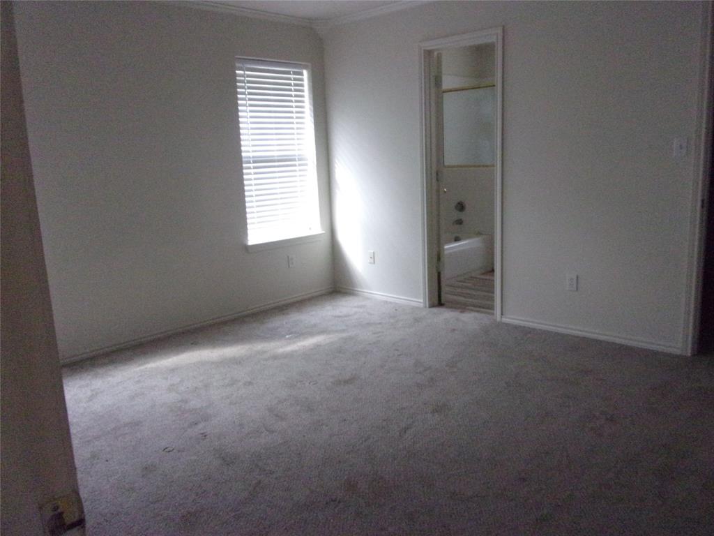 1511 Spanish Oak Drive Granbury, TX 76048 - Photo 9 of 16 an empty room with windows and closet
