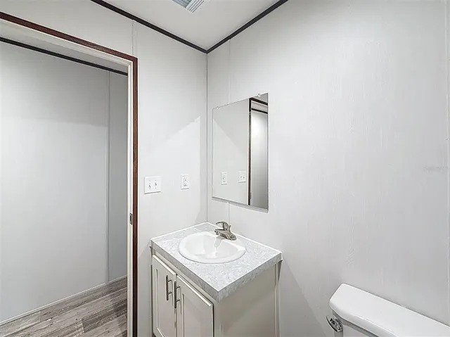 a bathroom with a sink and a toilet