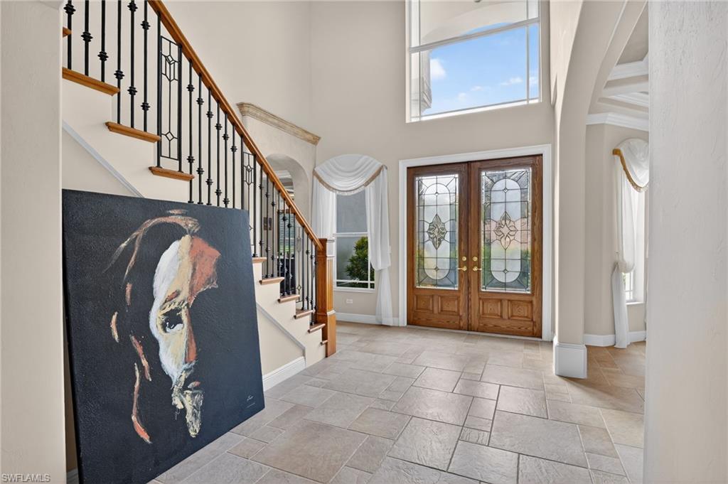 1964 Rialto Way Alva, FL 33920 - Photo 6 of 50 a view of an entryway with workspace and stairs