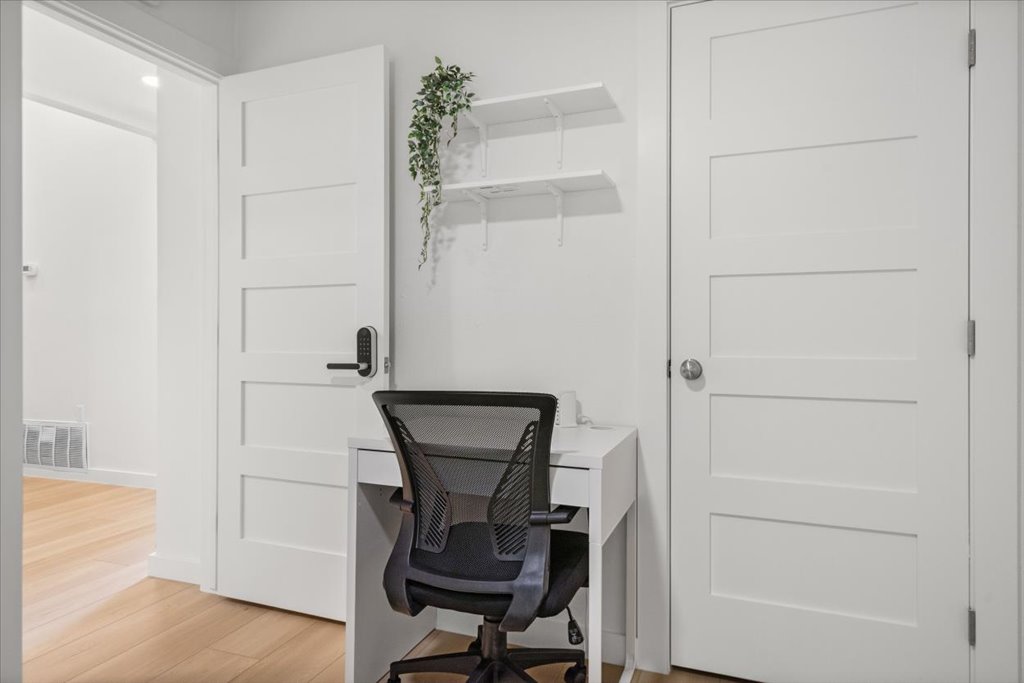 1406 North Georgetown Street Round Rock, TX 78664 - Photo 13 of 34 Functional workspace, perfect for productivity or quiet study, offering a sleek design.