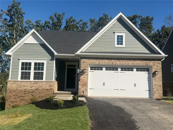 a view of house with yard
