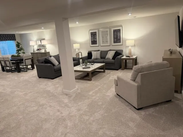 a living room with furniture and a window