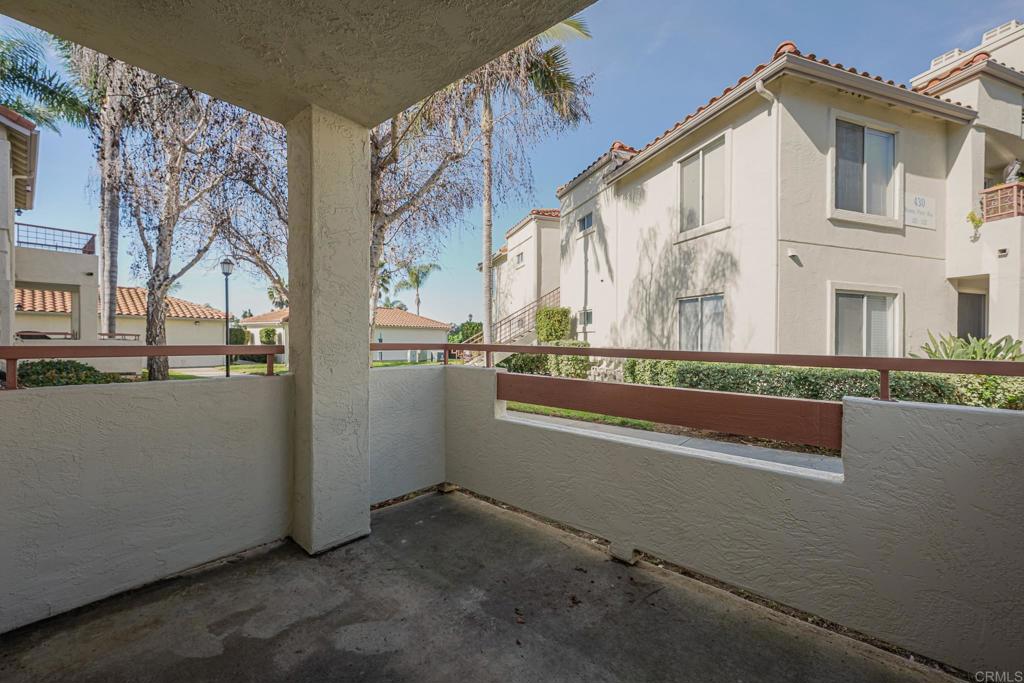 420 Stoney Point Way, Unit 113 Oceanside, CA 92058 - Photo 34 of 45 VIEW FROM LIVING ROOM PATIO