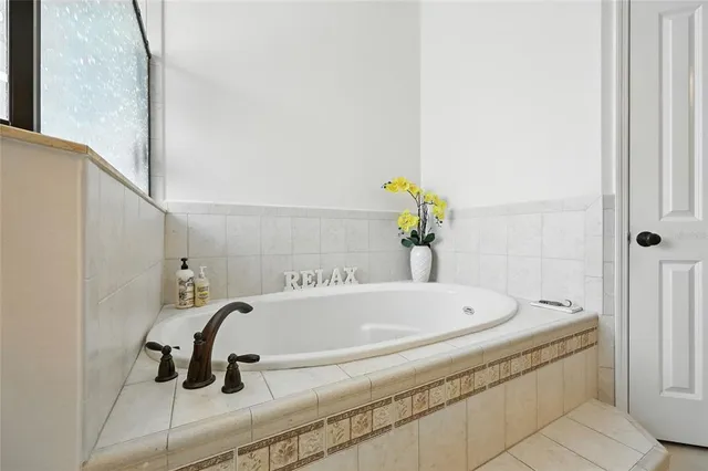 an aerial view of residential houses with outdoor space and street view