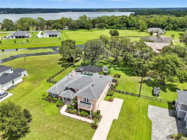 a living room with furniture or couch and a large window