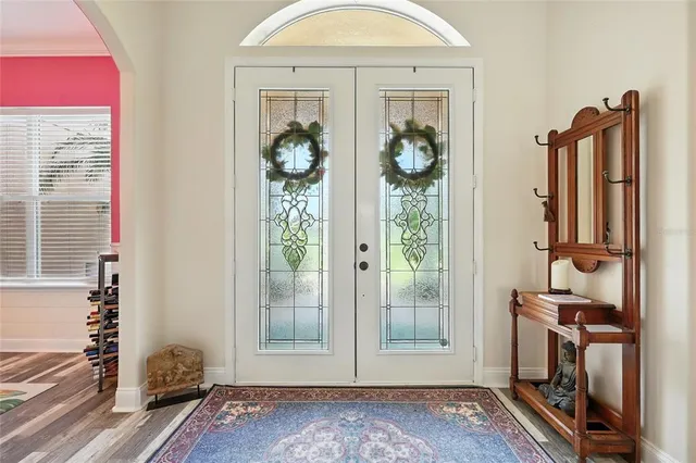 a living room with furniture fireplace and a flat screen tv