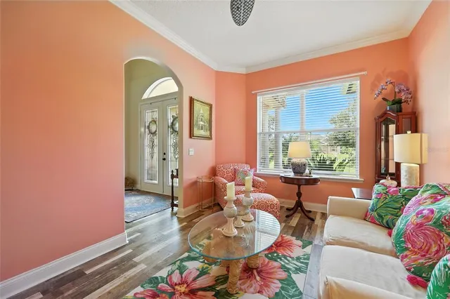 a view of a dining room with furniture and window
