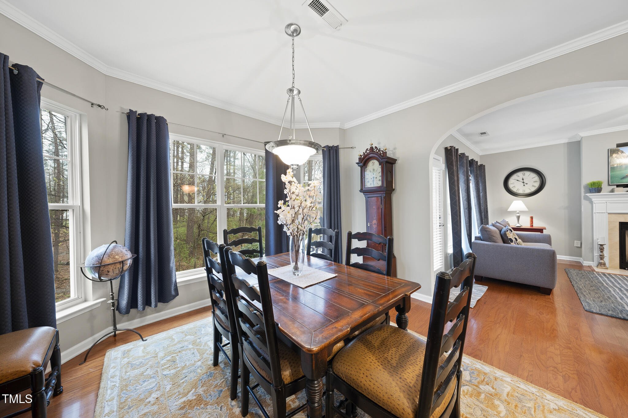 3419 Ranbir Drive Durham, NC 27713 - Photo 15 of 33 a view of a dining room with furniture window and wooden floor