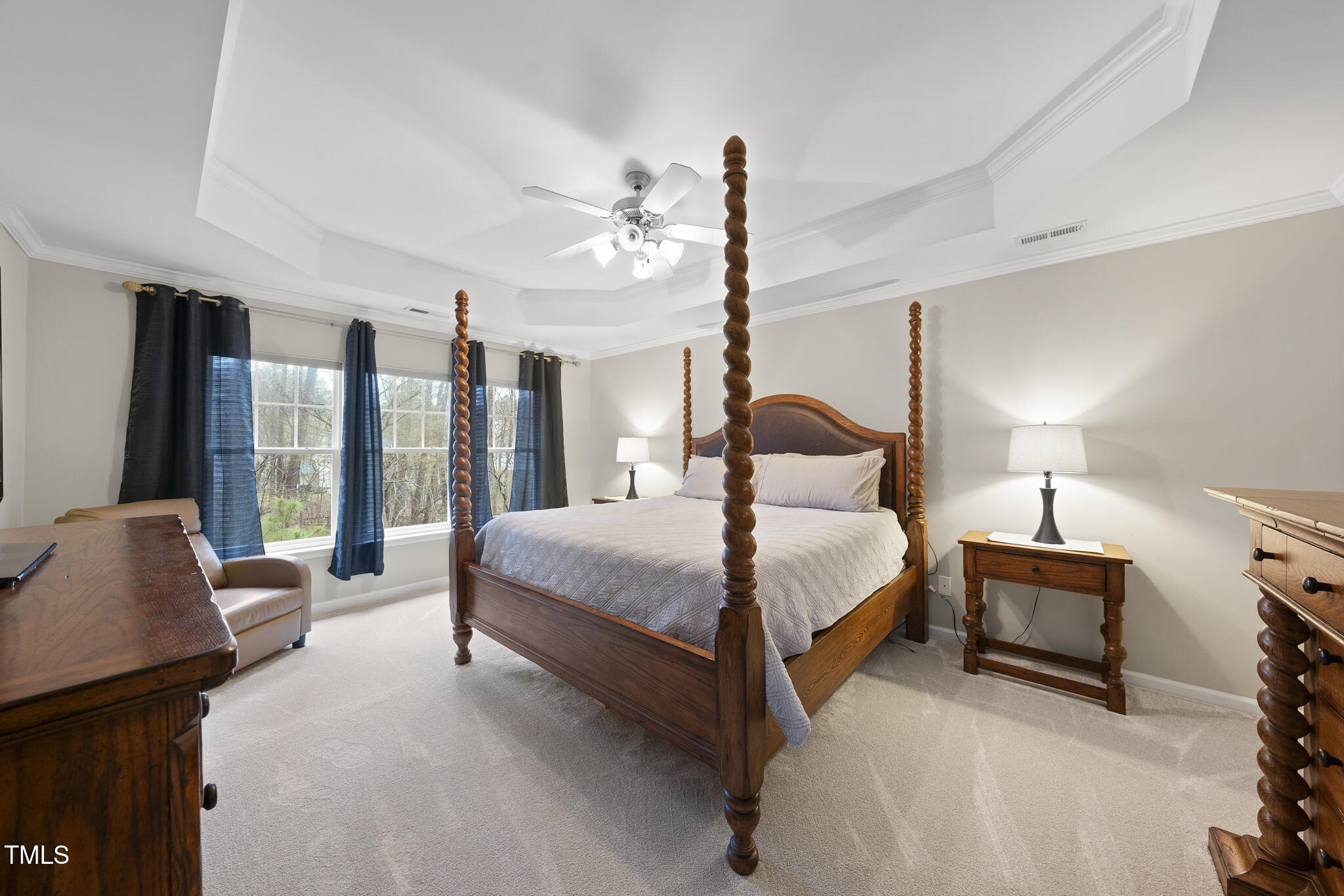 3419 Ranbir Drive Durham, NC 27713 - Photo 17 of 33 a bedroom with a bed couch and large window