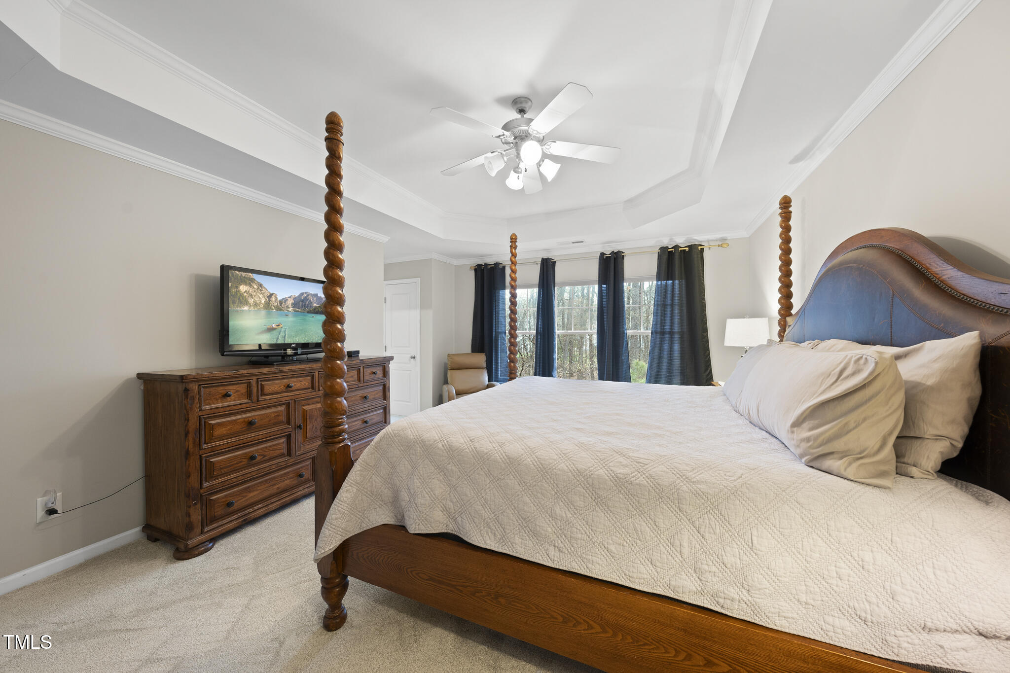 3419 Ranbir Drive Durham, NC 27713 - Photo 18 of 33 a bedroom with a bed and a dresser
