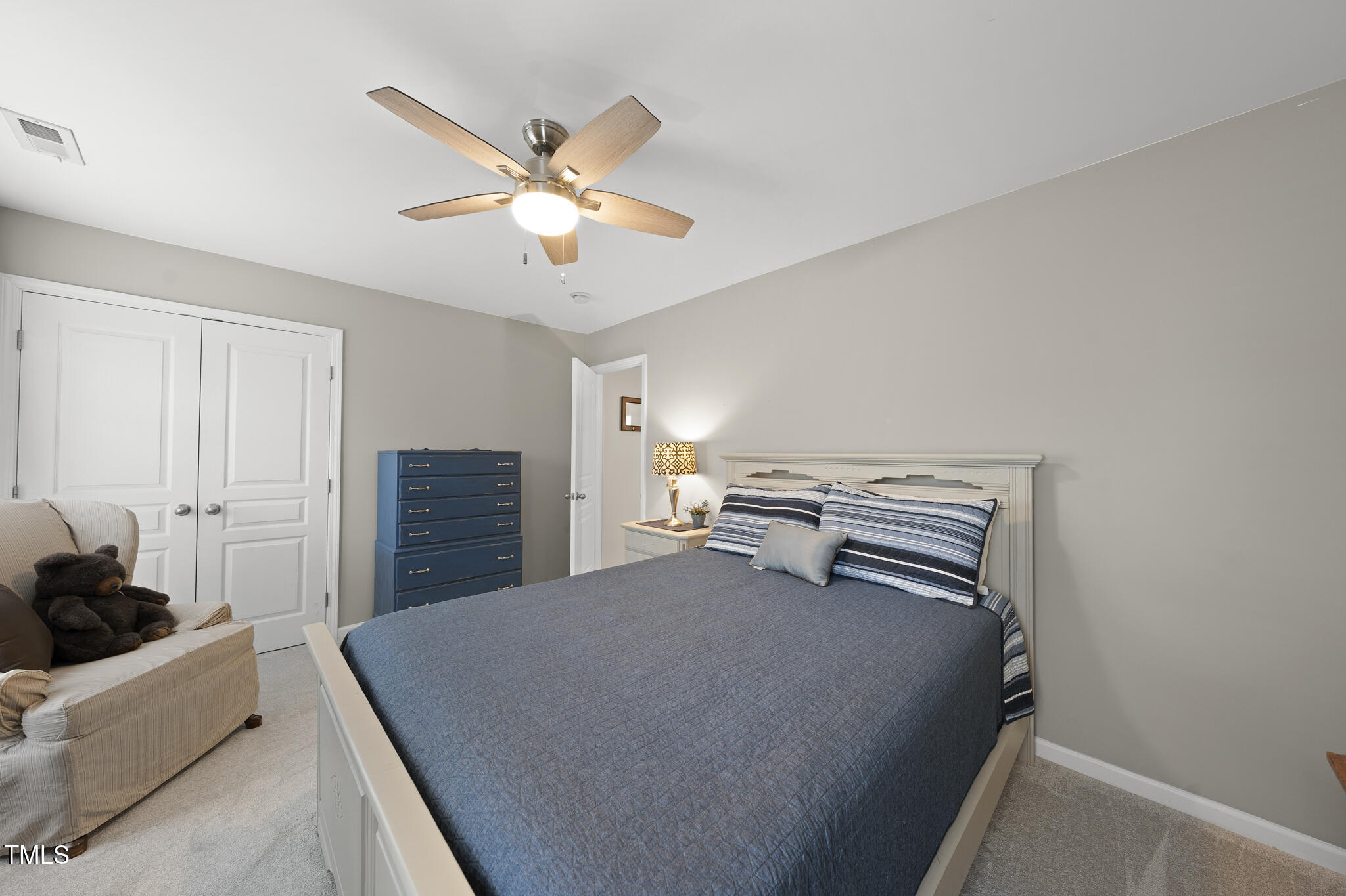 3419 Ranbir Drive Durham, NC 27713 - Photo 24 of 33 a bedroom with a bed and a couch