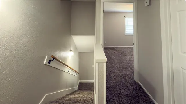 a view of hallway with shower