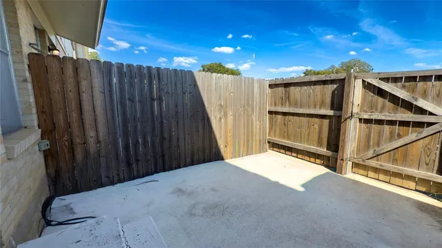 a view of a backyard of a house