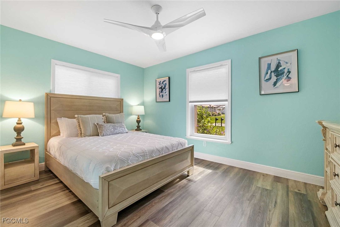 2307 Southwest 40th Street Cape Coral, FL 33914 - Photo 17 of 36 a bedroom with a bed and window