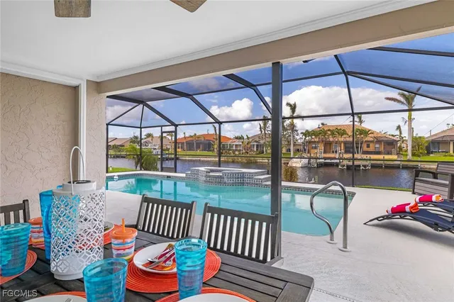 a patio with table and chairs