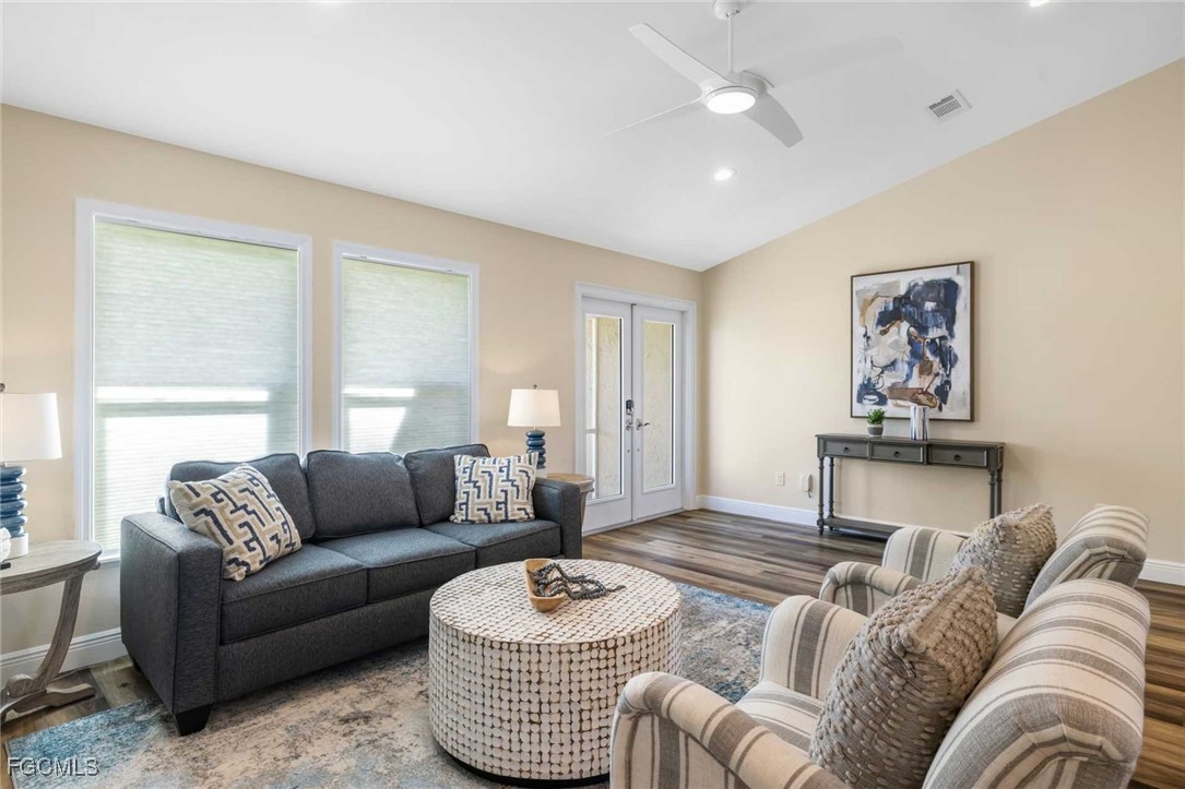 2307 Southwest 40th Street Cape Coral, FL 33914 - Photo 27 of 36 a living room with furniture and a couch