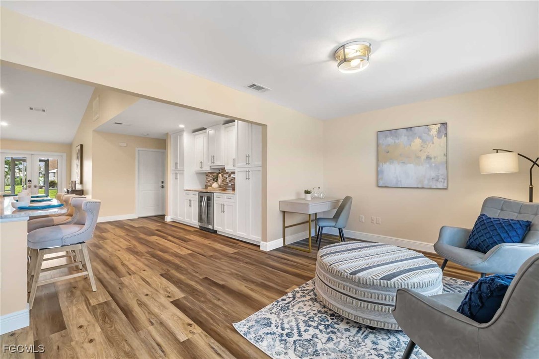 2307 Southwest 40th Street Cape Coral, FL 33914 - Photo 29 of 36 a living room with furniture and a table