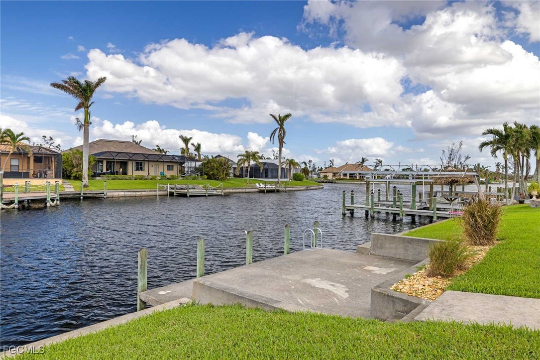 2307 Southwest 40th Street Cape Coral, FL 33914 - Photo 3 of 36 a view of a lake with houses