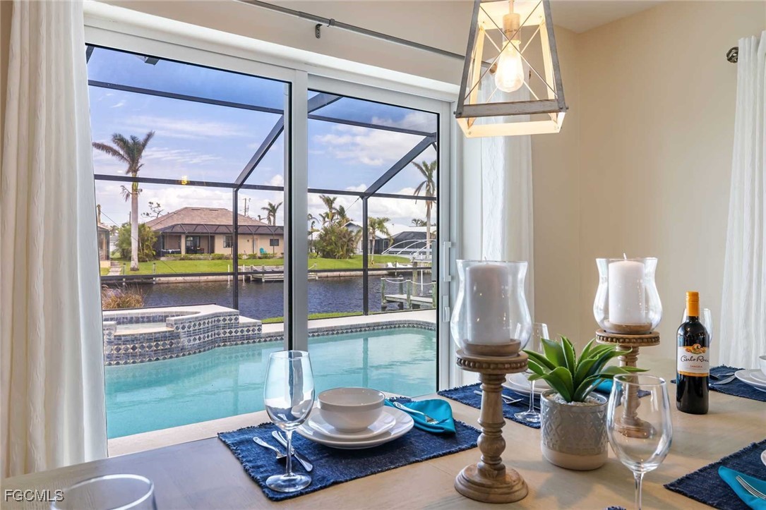 2307 Southwest 40th Street Cape Coral, FL 33914 - Photo 34 of 36 a living room with furniture and a potted plant