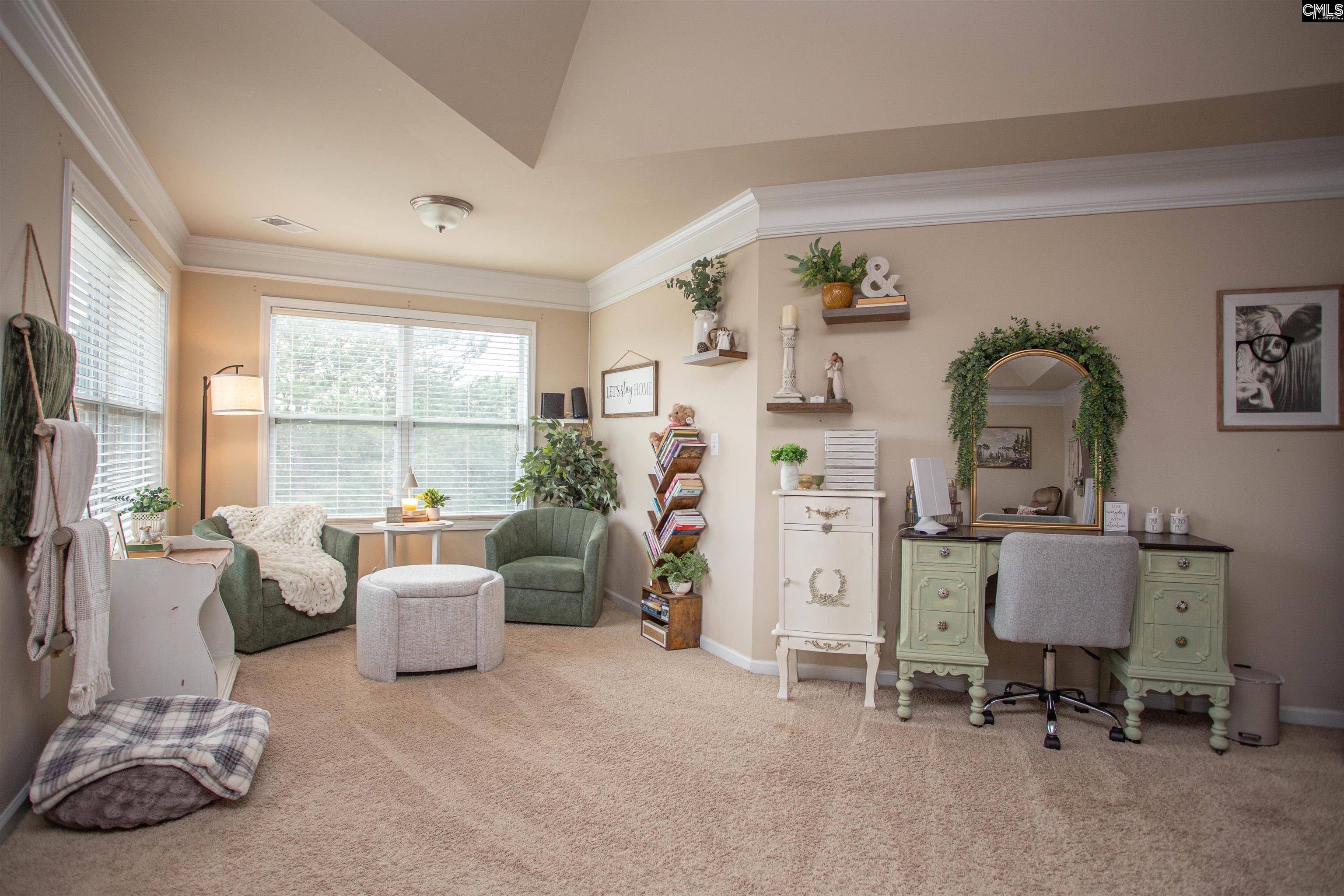7 Templand Court Elgin, SC 29045 - Photo 29 of 47 a living room with furniture and a large window