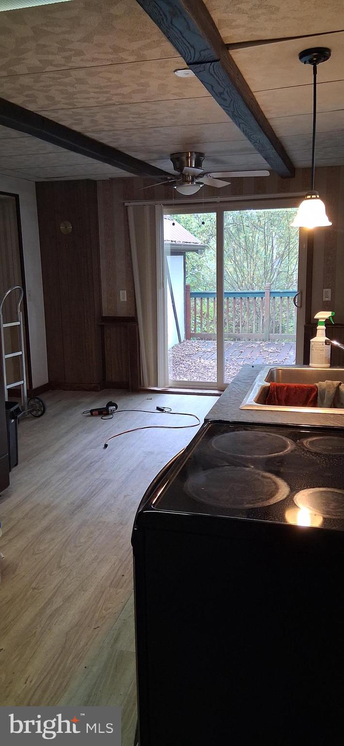 139 Church Street Twin Rocks, PA 15960 - Photo 19 of 47 a bedroom with a bed and large windows