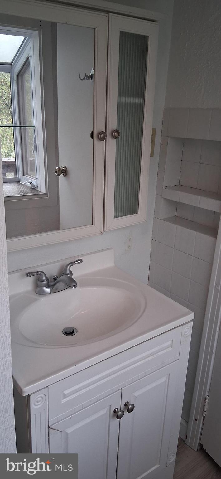 139 Church Street Twin Rocks, PA 15960 - Photo 29 of 47 a bathroom with a sink and a mirror