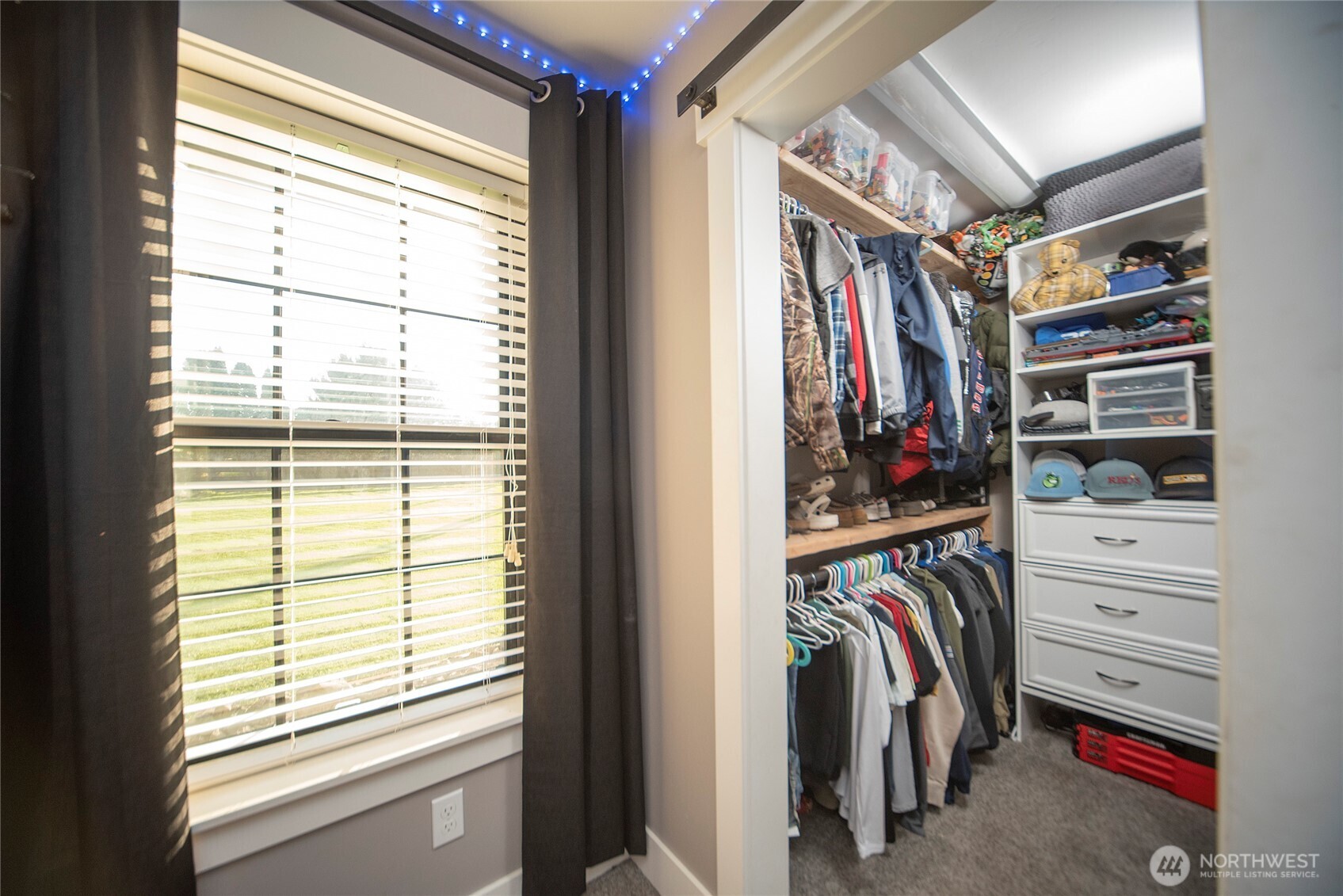 110 Brown Road Ellensburg, WA 98926 - Photo 16 of 40 a view of walk in closet with clothes and shoes