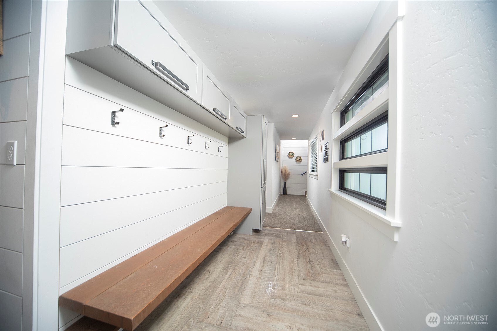 110 Brown Road Ellensburg, WA 98926 - Photo 22 of 40 a view of a hallway with wooden floor and staircase