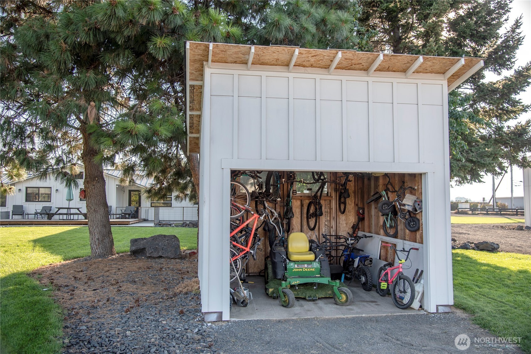110 Brown Road Ellensburg, WA 98926 - Photo 30 of 40 a view of a patio with a table and chairs under an umbrella