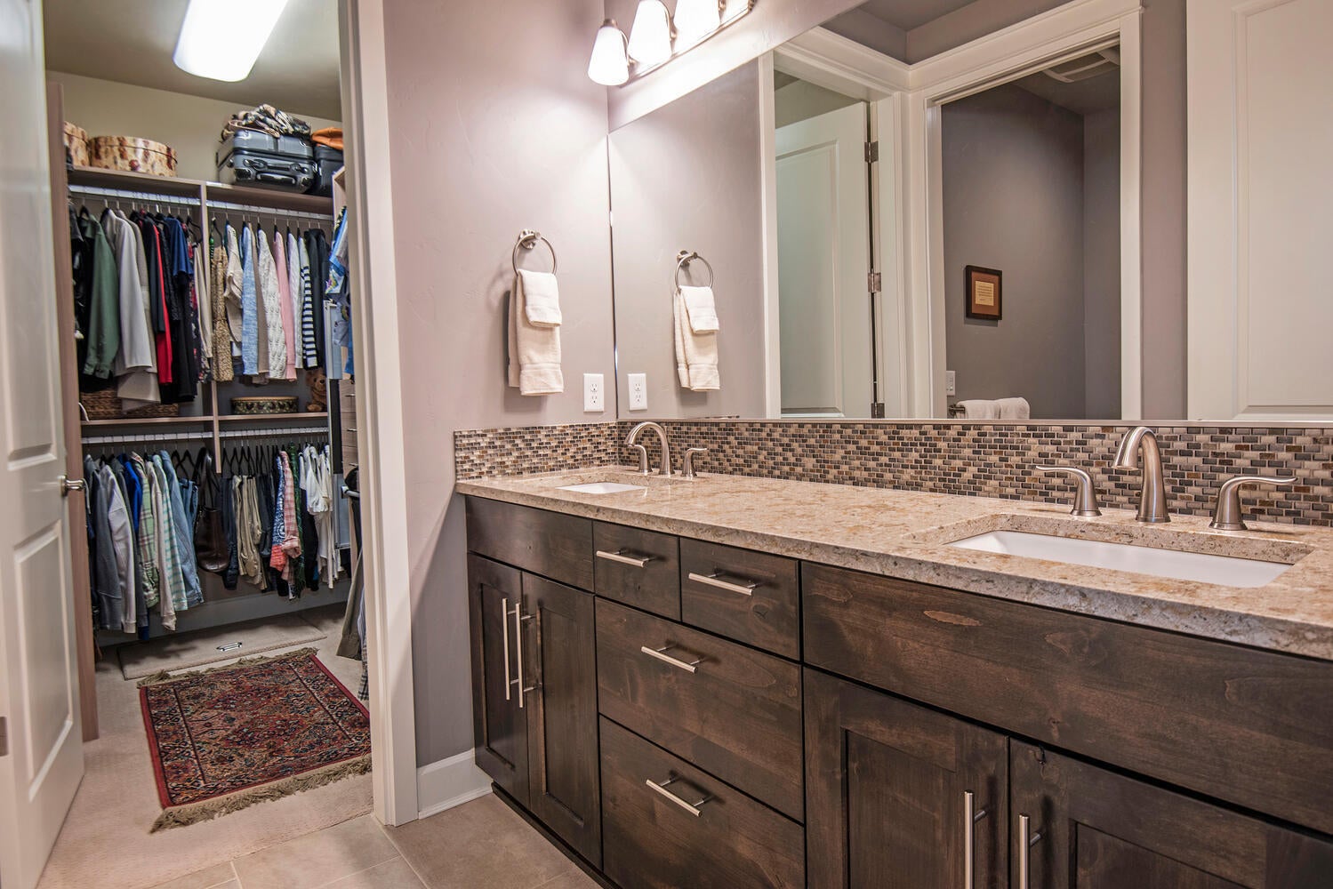 2630 Northwest Boulder Ridge Loop Bend, OR 97703 - Photo 20 of 31 Double sinks, quartz countertops, walk-in closet, shower, and commode room.